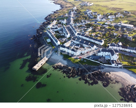 Port Charlotte is a town on the west coast of Islay, Scotland. Whisky distilleries and hotels dot the area, with scenic shorelines and historic charm. 127528691