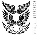 Set of Three Pairs of Stylized Black Angel Wings with Ornamental Feathers in Tribal Tattoo Style on White Background 127528795
