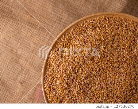 Organic golden flaxseed, linseed grains. Superfood high in fiber. Organic golden flaxseed, linseed grains. Superfood high in fiber. 127530270