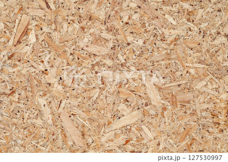 Chipboard plywood yellow close-up, uniform texture background  127530997