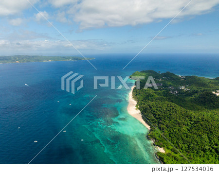 Aerial view of sandy beach with turquoise waters and corals in Puka Shell Beach in Boracay Island. Philippines. 127534016