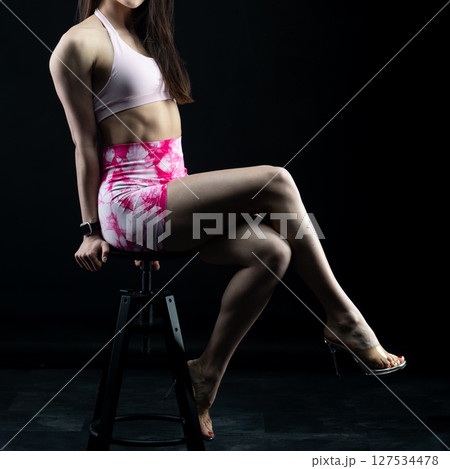 athletic female body on dark background, fitness woman, athletic girl torso athletic female body on dark background, fitness woman, athletic girl torso 127534478