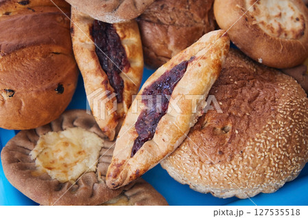 Lots of pies close-up, top view 127535518