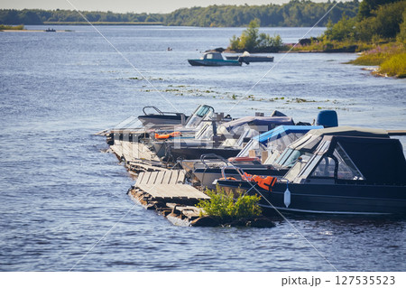 Boat parking pier on the river 127535523