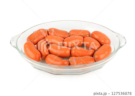 Meat sausages isolated on white. 127536878