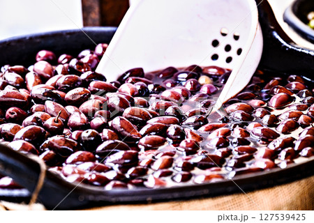 Bowl of fresh and delicious black olives. 127539425