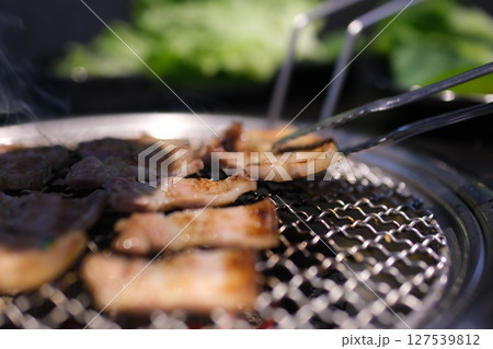 grill meat with lard thin Crispy golden grilled pork belly . 127539812