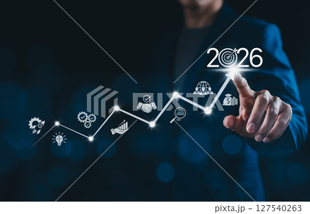 The 2026 new year business goals concept. Businessman touching increase arrow graph company future growth 2026. Business plan target strategy, Planning and challenge business strategy in new year, 127540263