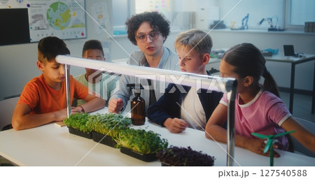 Teacher Educating Biology to Group of Smart Kids in Multicultural Classroom Teacher Educating Biology to Group of Smart Kids in Multicultural Classroom 127540588