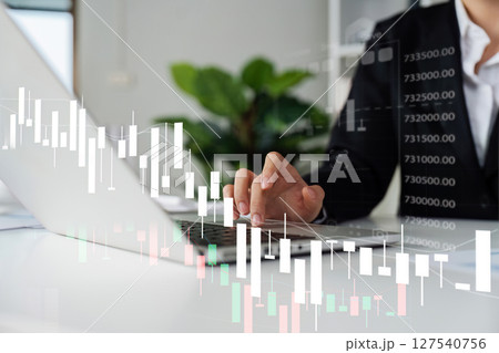 Business woman use laptop and tablet analyzing company growth, future business growth Business woman use laptop and tablet analyzing company growth, future business growth 127540756