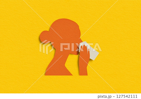 Orange silhouette of a woman with white handkerchief paper cutout style set against a vibrant yellow background, symbolizing the concept of allergy 127542111
