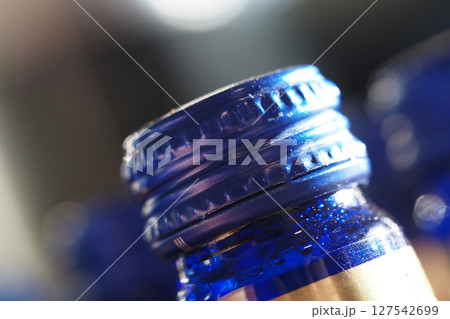 Cobalt blue bottle cap close-up in natural light 127542699