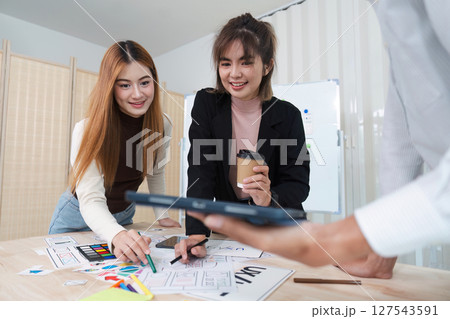 UI designer and UX developer brainstorm together. Creative digital development agency. UX UI concept UI designer and UX developer brainstorm together. Creative digital development agency. UX UI concept 127543591