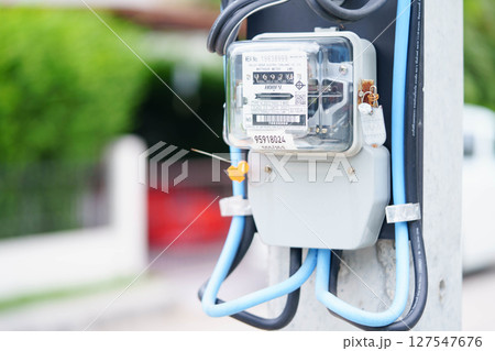 Bangkok, Thailand April 7, 2025 Electric measuring power meter for energy cost at home and office. Bangkok, Thailand April 7, 2025 Electric measuring power meter for energy cost at home and office. 127547676