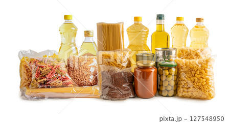 Foodstuffs in donation box isolated on white background. Foodstuffs in donation box isolated on white background. 127548950