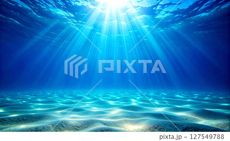 underwater world background, clear blue ocean water with ripple texture, water transitions from a dazzling turquoise in the shallows to a deep sapphire blue, creating a perfect tropical backdrop 127549788