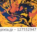 Moody dark blue and fiery gold fluid swirls form a dramatic marble pattern, perfect for intense contemporary backgrounds or energetic design themes 127552947