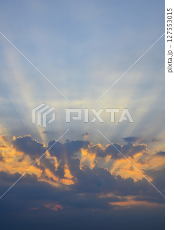 The rays of the rising sun in the clouds in the sky over Vietnam The rays of the rising sun in the clouds in the sky over Vietnam 127553015