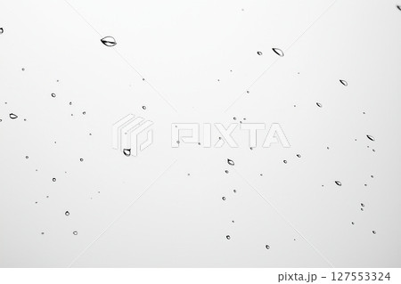 Mesmerizing array of small water droplets scattered in space Mesmerizing array of small water droplets scattered in space 127553324