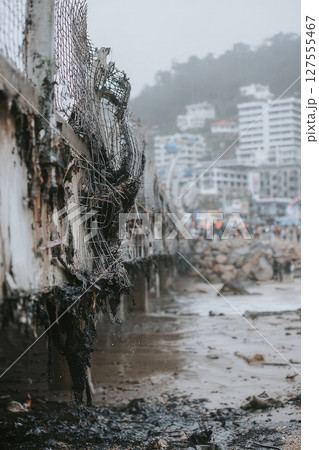 Construction is ongoing to repair the road after it was damaged in a landslide 127555467