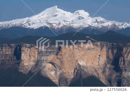 The Balagezong national park in Shangri-la, China, offers a breathtaking landscape view from the top of the mountains, making it a beautiful travel destination with a large river at its base 127556026