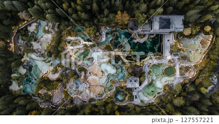 Huanglong National Park, situated near Jiuzhaijou in SiChuan, China, boasts a breathtaking pond with multiple hues Huanglong National Park, situated near Jiuzhaijou in SiChuan, China, boasts a breathtaking pond with multiple hues 127557221