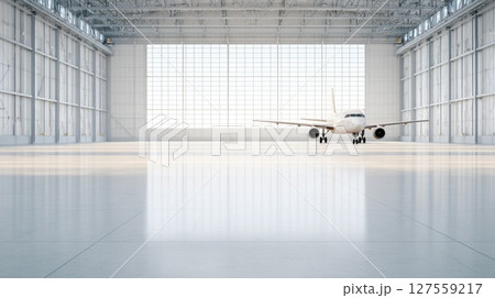 Commercial Jet in Empty Aircraft Hangar 127559217