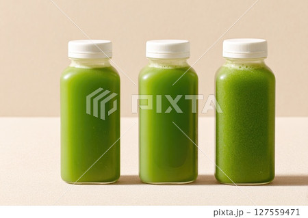 Trio of Green Juice Bottles for Detox or Healthy Living Trio of Green Juice Bottles for Detox or Healthy Living 127559471