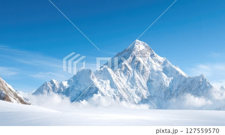 Majestic Snow-Covered Mountain Peak under Blue Sky 127559570