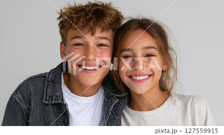 Happy Teen Siblings Smiling Together Happy Teen Siblings Smiling Together 127559915