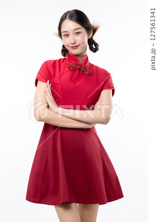 Portrait of joyful beauty Asian woman in red Cheongsam Chinese traditional dress isolated on white background. 127561341