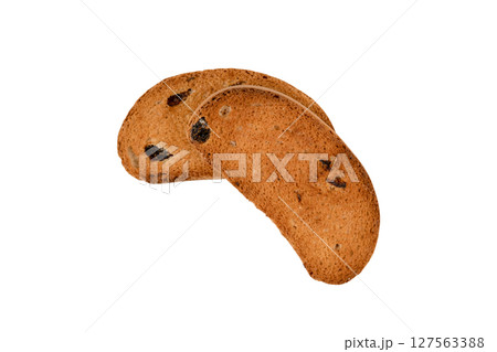 Isolated slice of bread with raisins 127563388