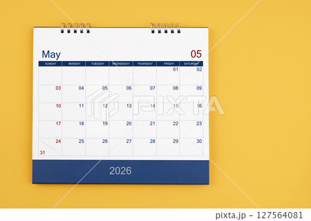 May 2026 desk calendar on the yellow table, planning for business meeting or planning concept. 127564081