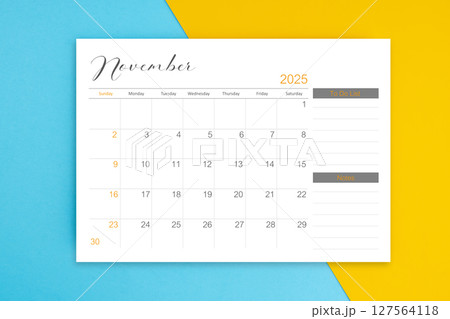 November 2025 calendar pagewith to do list on blue color background. November 2025 calendar pagewith to do list on blue color background. 127564118