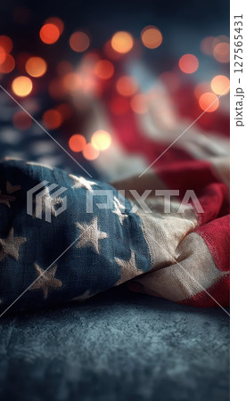 American flag with festive bokeh lights celebrating Independence Day and patriotic national pride 127565431