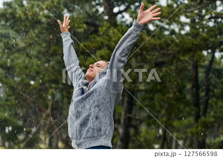 Beautiful Woman Enjoying Rainy Day After Intense Run Beautiful Woman Enjoying Rainy Day After Intense Run 127566598