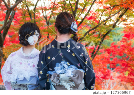 Japanese friends in kimono view autumn color, Kiyomizudera, Kyoto Japanese friends in kimono view autumn color, Kiyomizudera, Kyoto 127566967