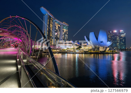 Helix bridge light up with Marina Bay Sands at night, Singapore 127566979