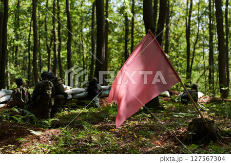 A disciplined and specialized military unit, donned in camouflage, strategically patrolling and maintaining control in a high-stakes environment, showcasing their precision, unity, and readiness for A disciplined and specialized military unit, donned in camouflage, strategically patrolling and maintaining control in a high-stakes environment, showcasing their precision, unity, and readiness for 127567304