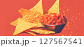 Crispy tortilla chips served with flavorful salsa, perfect for snacking during gatherings. 127567541