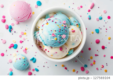 Colorful Scoops of Ice Cream With Rainbow Sprinkles in a Bowl. 127569104