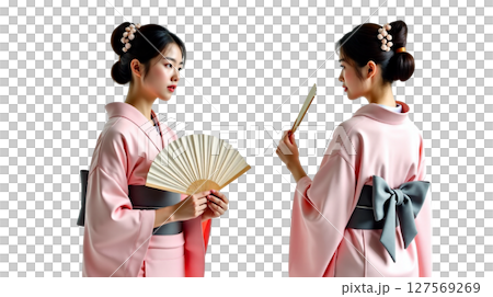 A young Japanese woman wears a modern kimono while posing in two different stances. She holds a fan, exuding grace and elegance, perfectly embodying traditional and contemporary style. 127569269