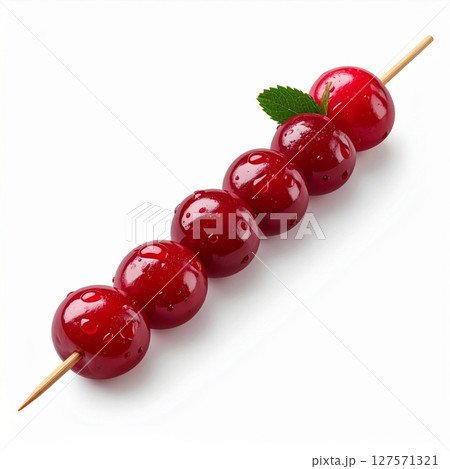 Red Cherries on a Wooden Skewer with Mint Leaf 127571321