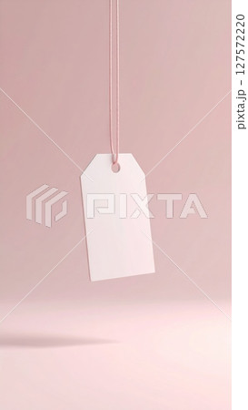 Blank White Tag Hanging on Pink String 127572220