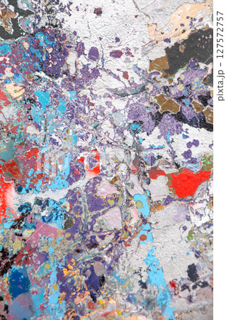 Abstract textured painting with bold splashes of blue, purple, and red. A visually striking Abstract textured painting with bold splashes of blue, purple, and red. A visually striking 127572757