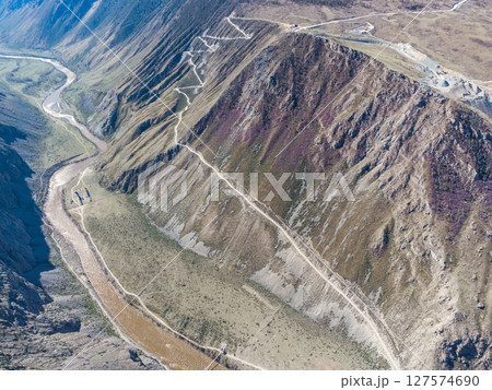 Mountain pass Katu-Yaryk. Valley of the mountain river Chulyshman. Landscape. Mountain dangerous road. 127574690