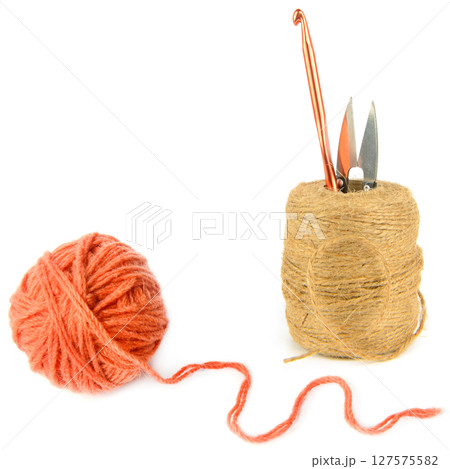 Ball of hemp rope,Ball of terracotta yarn, crochet hook and scissors isolated on white background. 127575582