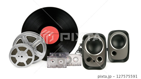 Music speakers, filmstrip, audio cassettes, vinyl disc isolated on white background. 127575591