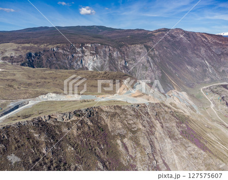 Construction of a new road to the Chulyshman River valley. Mountain pass Katu-Yaryk. Landscape. Mountain dangerous road. 127575607