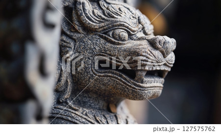 Intricately Carved Stone Lion Statue at Ancient Temple in Nepal 127575762